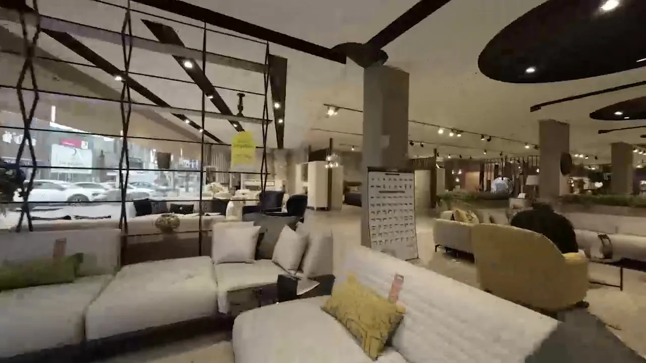 Karacalar Carpet & Furniture showroom — corner sofas by the window